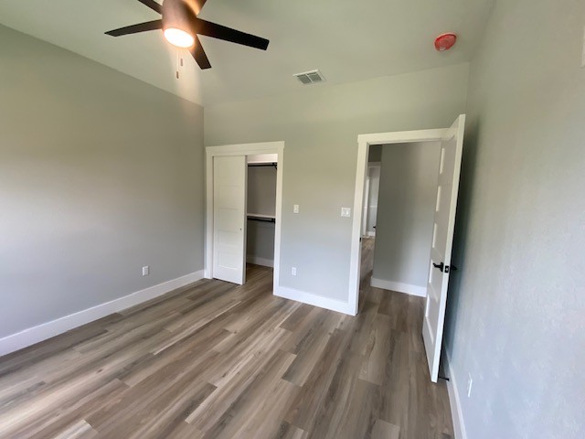 116 Field Street Luling, TX 78648 - Photo 26 of 33 A quiet retreat with stylish wood flooring and a refreshing ceiling fan.