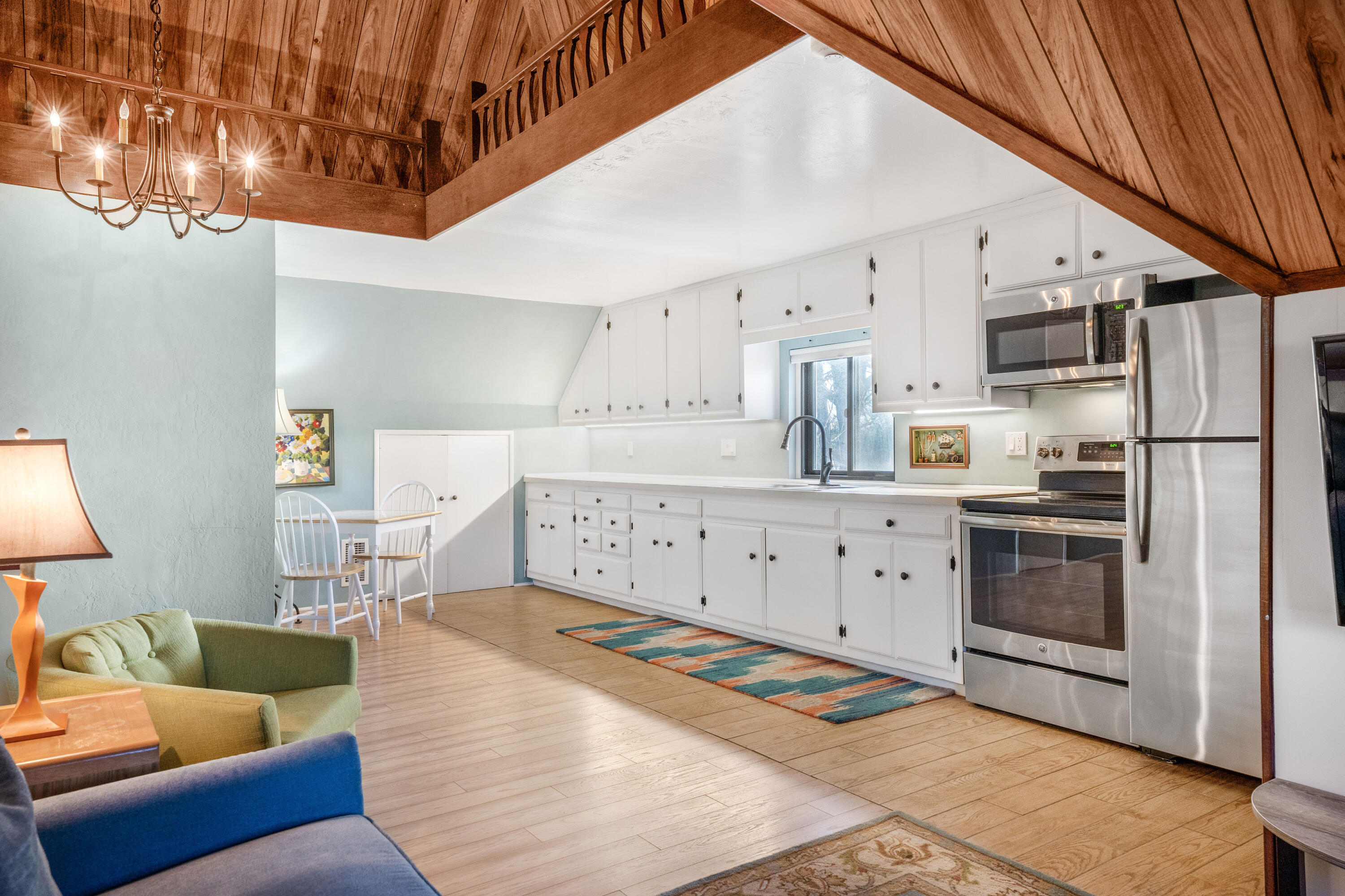 2620 Janin Way Solvang, CA 93463 - Photo 21 of 30 a kitchen with stainless steel appliances kitchen island granite countertop lots of white furniture