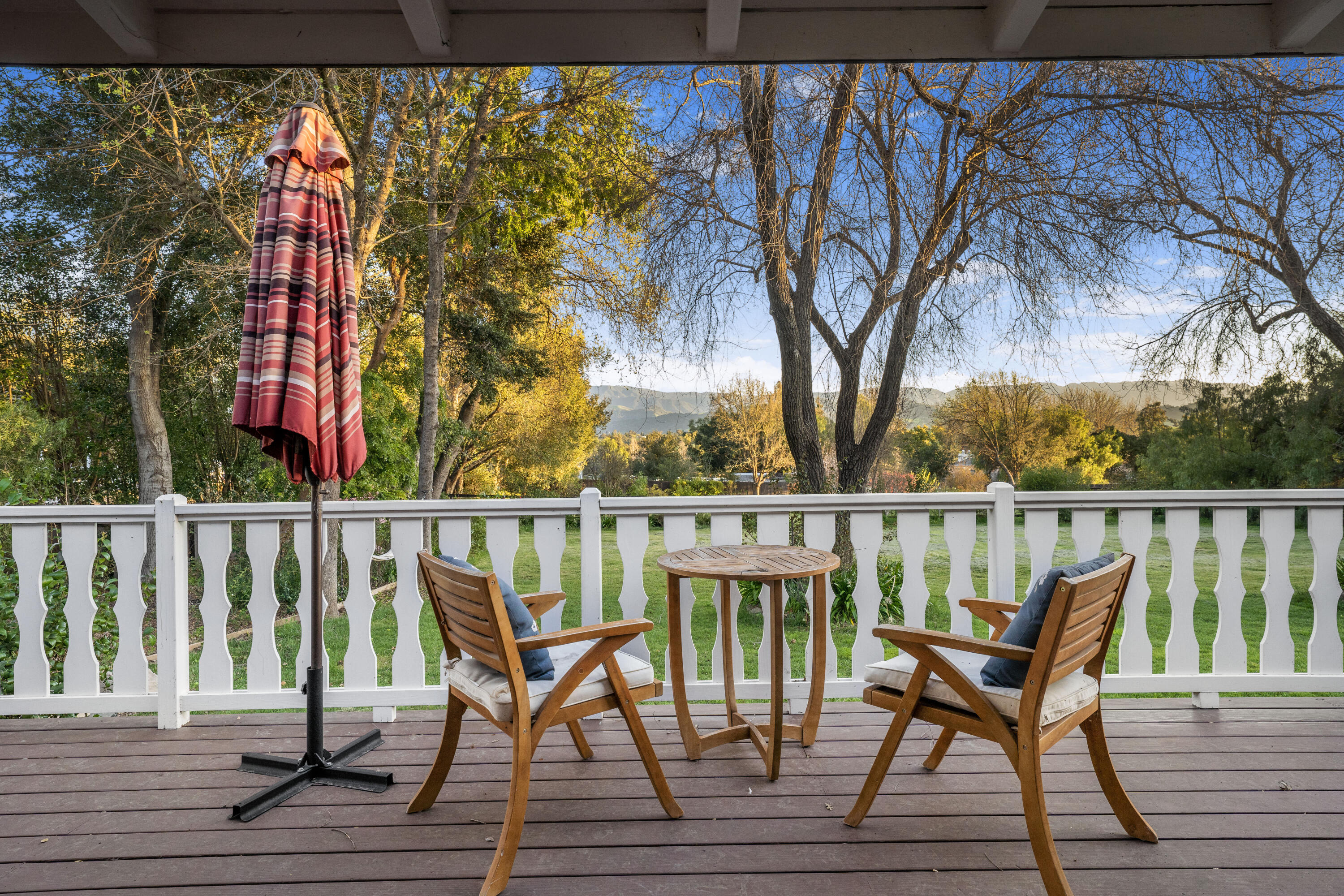 2620 Janin Way Solvang, CA 93463 - Photo 26 of 30 a balcony with wooden floor table and chairs