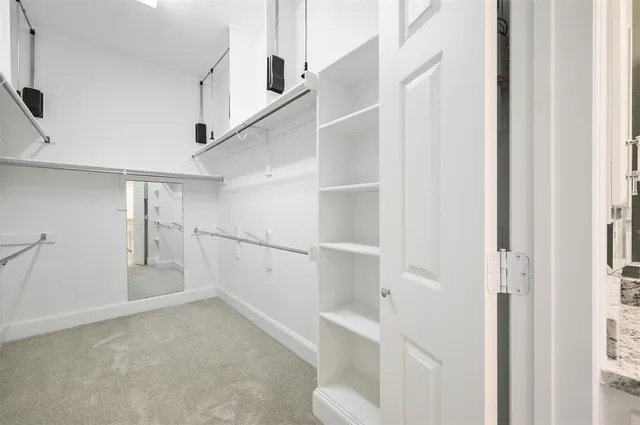 a view of small space with racks on the wall