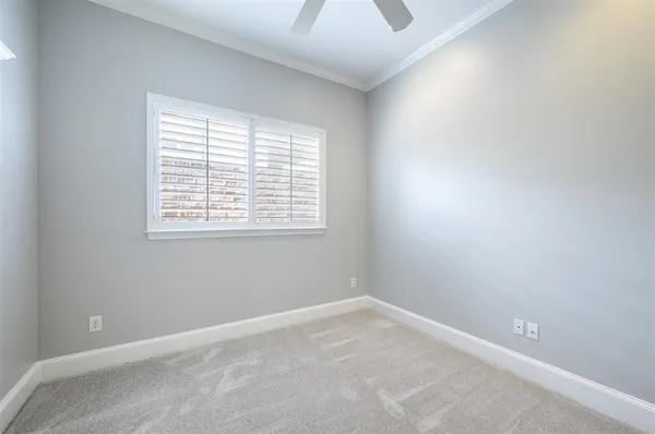 a bathroom with a granite countertop sink a toilet and bathtub