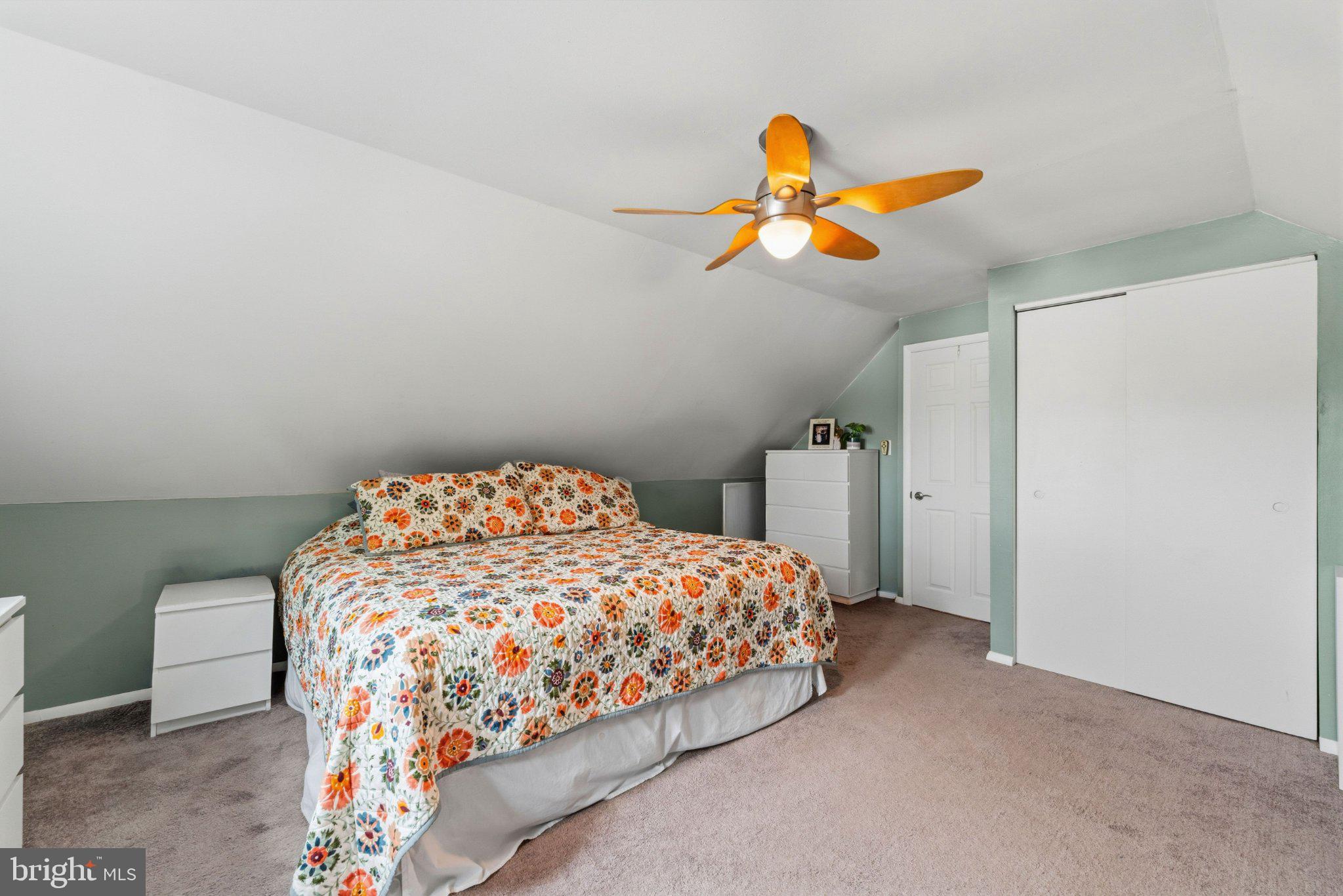 44 Quickset Road Levittown, PA 19057 - Photo 11 of 28 Cozy attic retreat with vibrant decor.