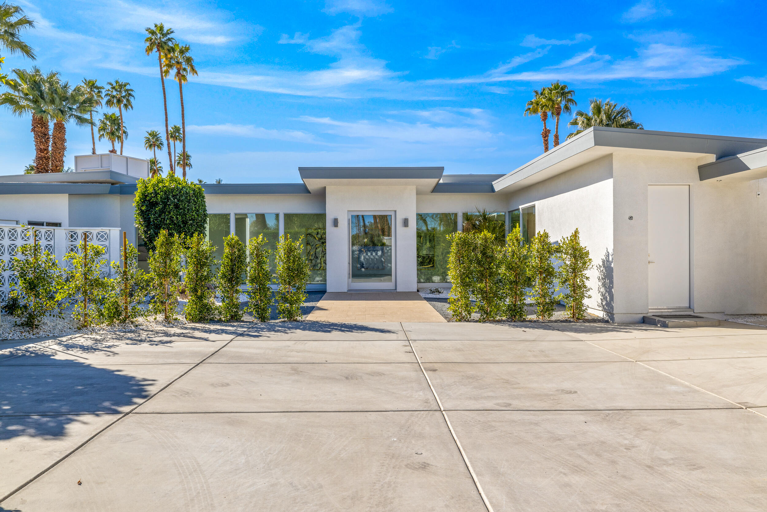 37521 Palm View Road Rancho Mirage, CA 92270 - Photo 1 of 61 a view of a house with potted plants