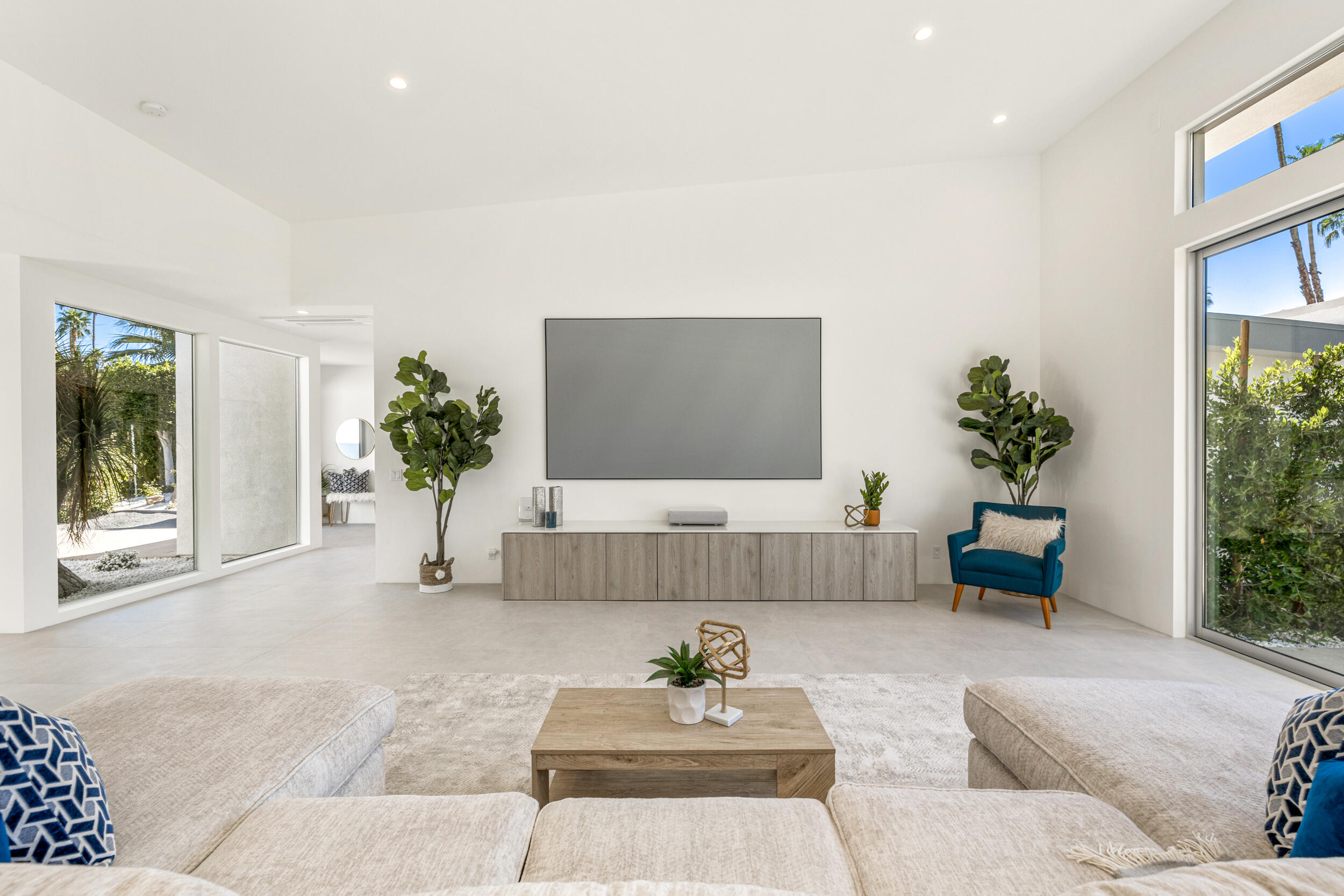 37521 Palm View Road Rancho Mirage, CA 92270 - Photo 17 of 61 a living room with furniture and a potted plant