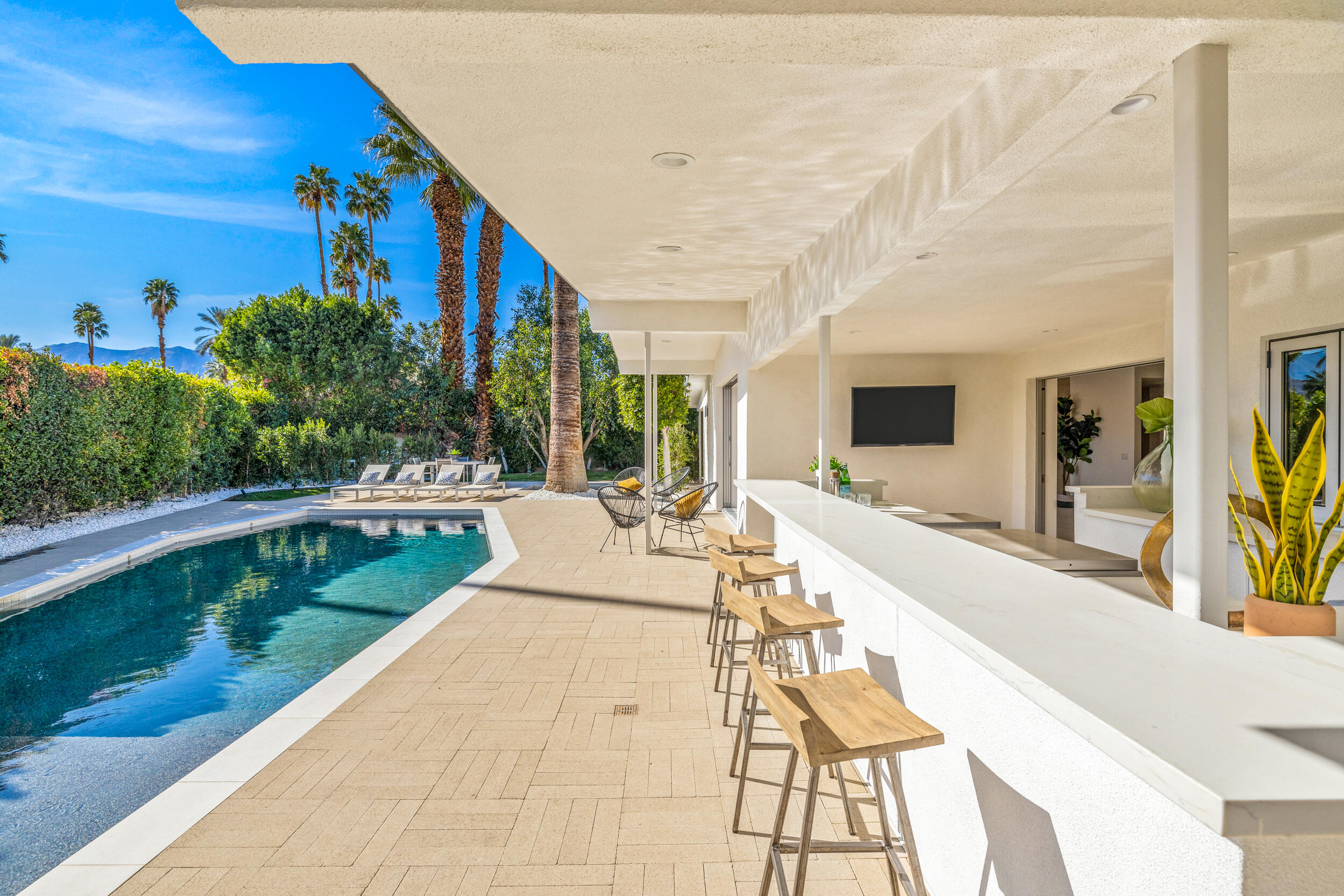 37521 Palm View Road Rancho Mirage, CA 92270 - Photo 40 of 61 a view of a swimming pool with a patio