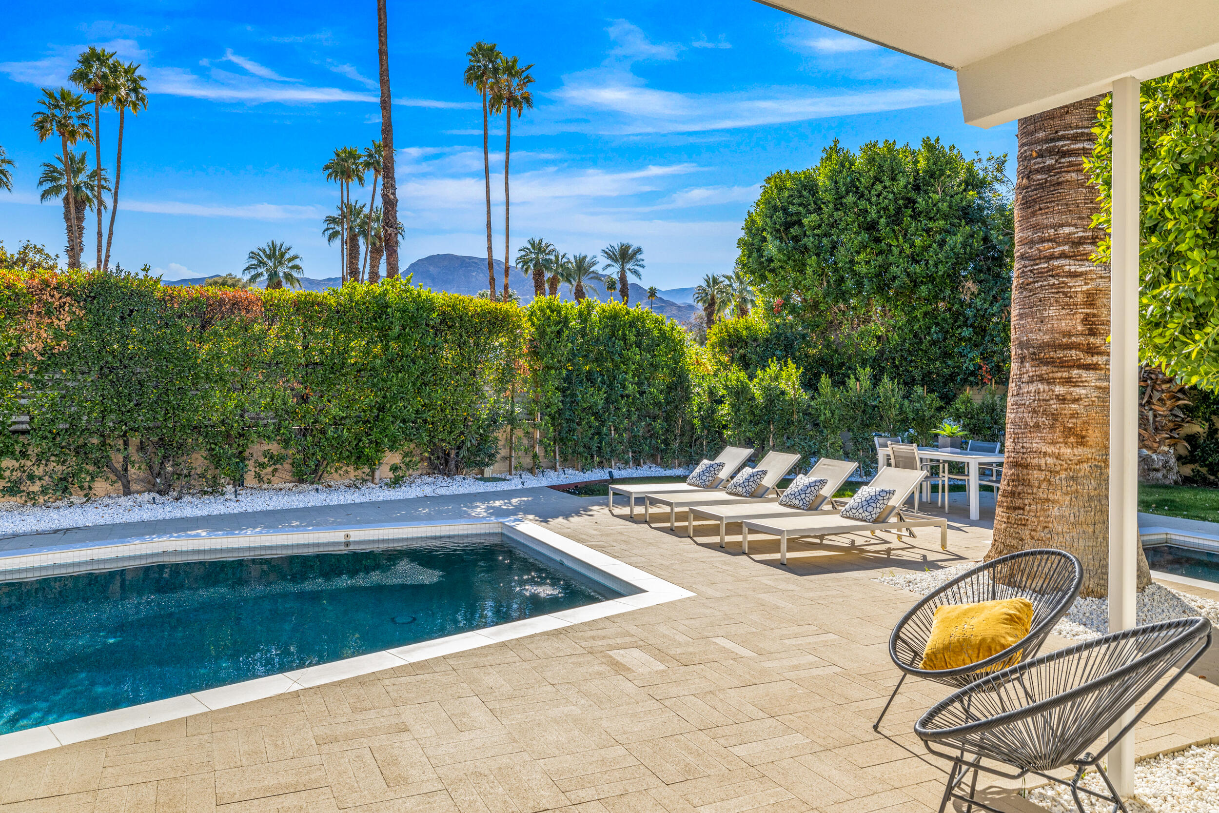 37521 Palm View Road Rancho Mirage, CA 92270 - Photo 42 of 61 a view of a swimming pool with a patio