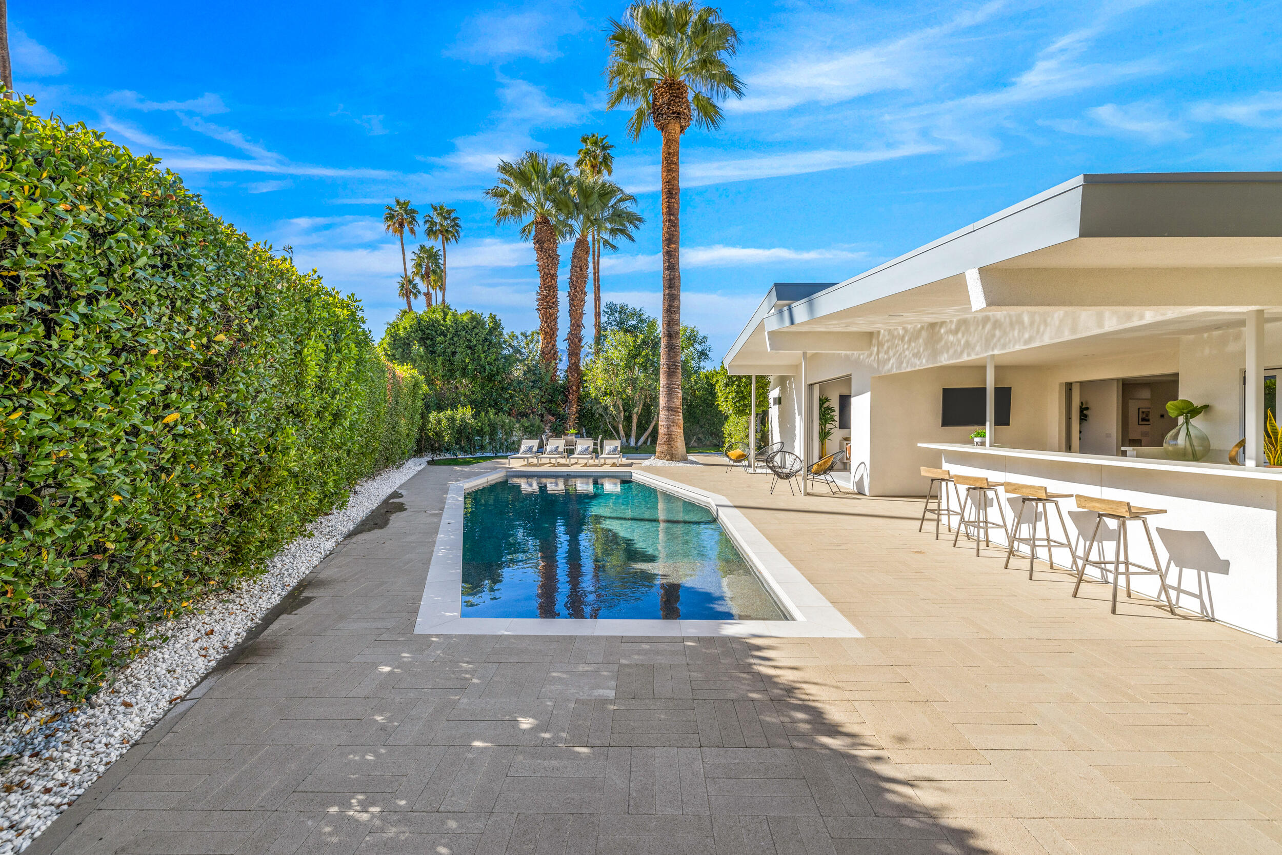 37521 Palm View Road Rancho Mirage, CA 92270 - Photo 47 of 61 a front view of a house with a yard