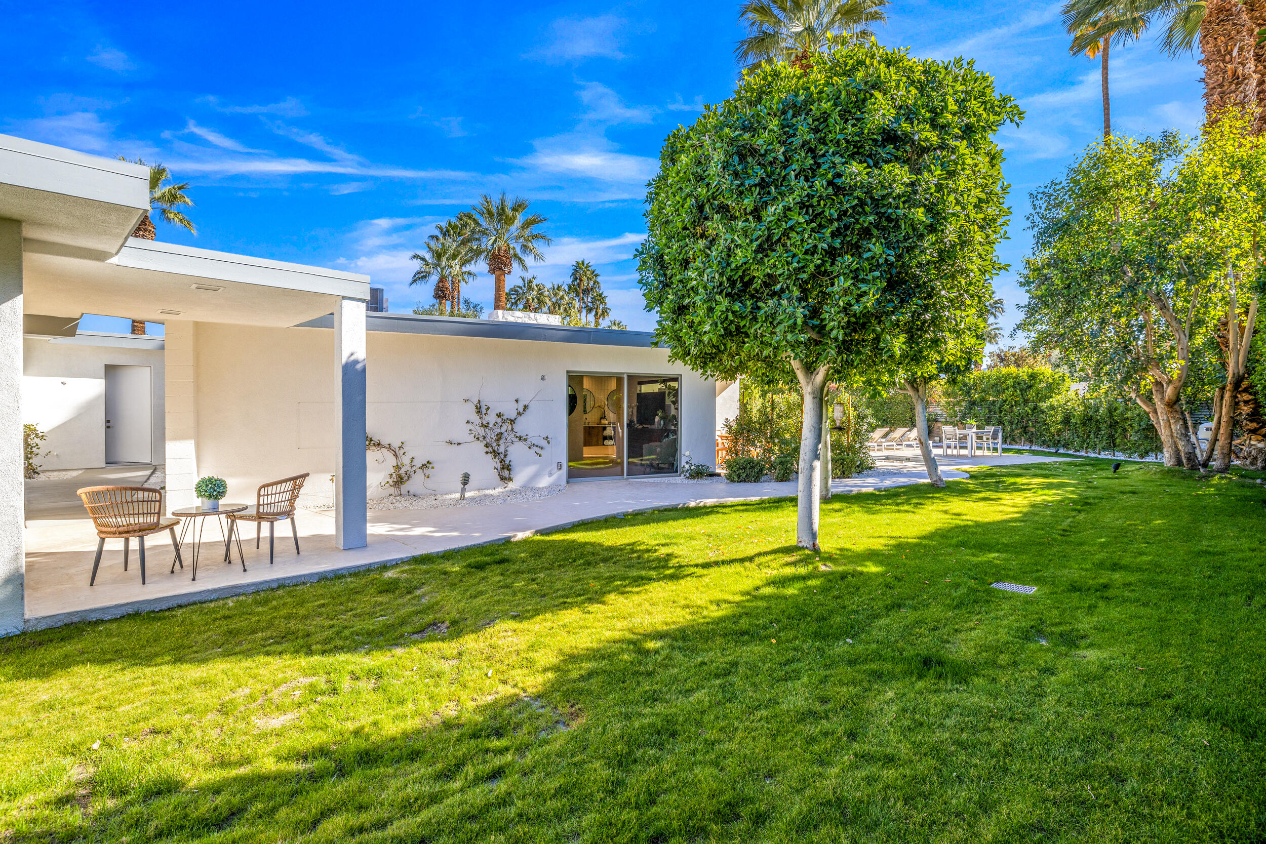 37521 Palm View Road Rancho Mirage, CA 92270 - Photo 50 of 61 a swimming pool with outdoor seating and yard