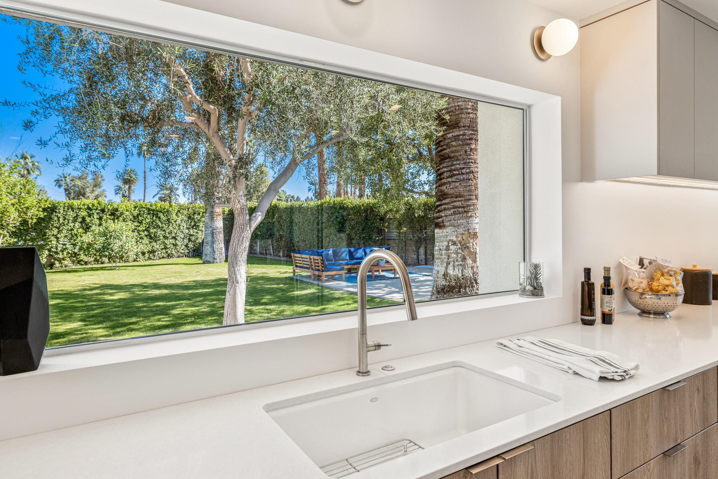 37521 Palm View Road Rancho Mirage, CA 92270 - Photo 5 of 61 a kitchen with a sink and a large window