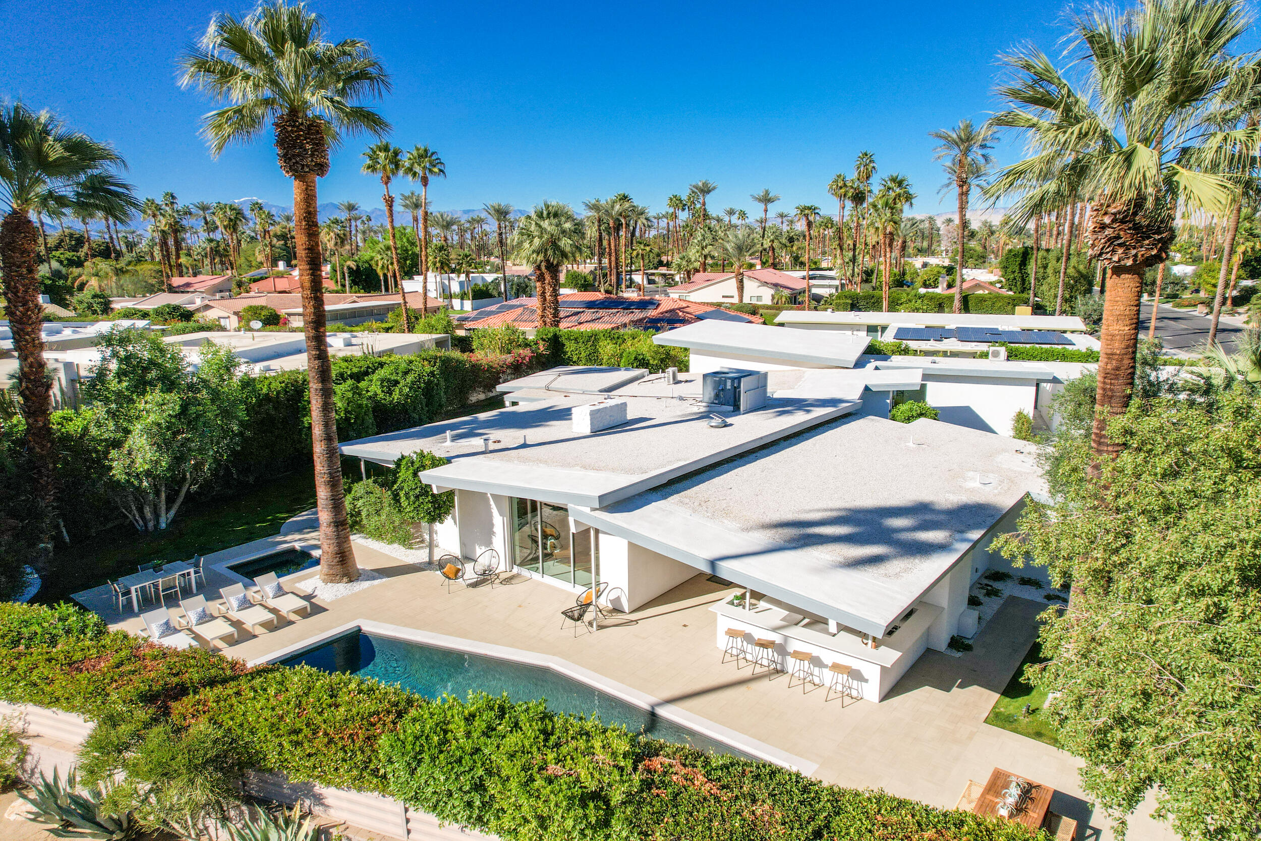 37521 Palm View Road Rancho Mirage, CA 92270 - Photo 56 of 61 a terrace with outdoor seating and city view