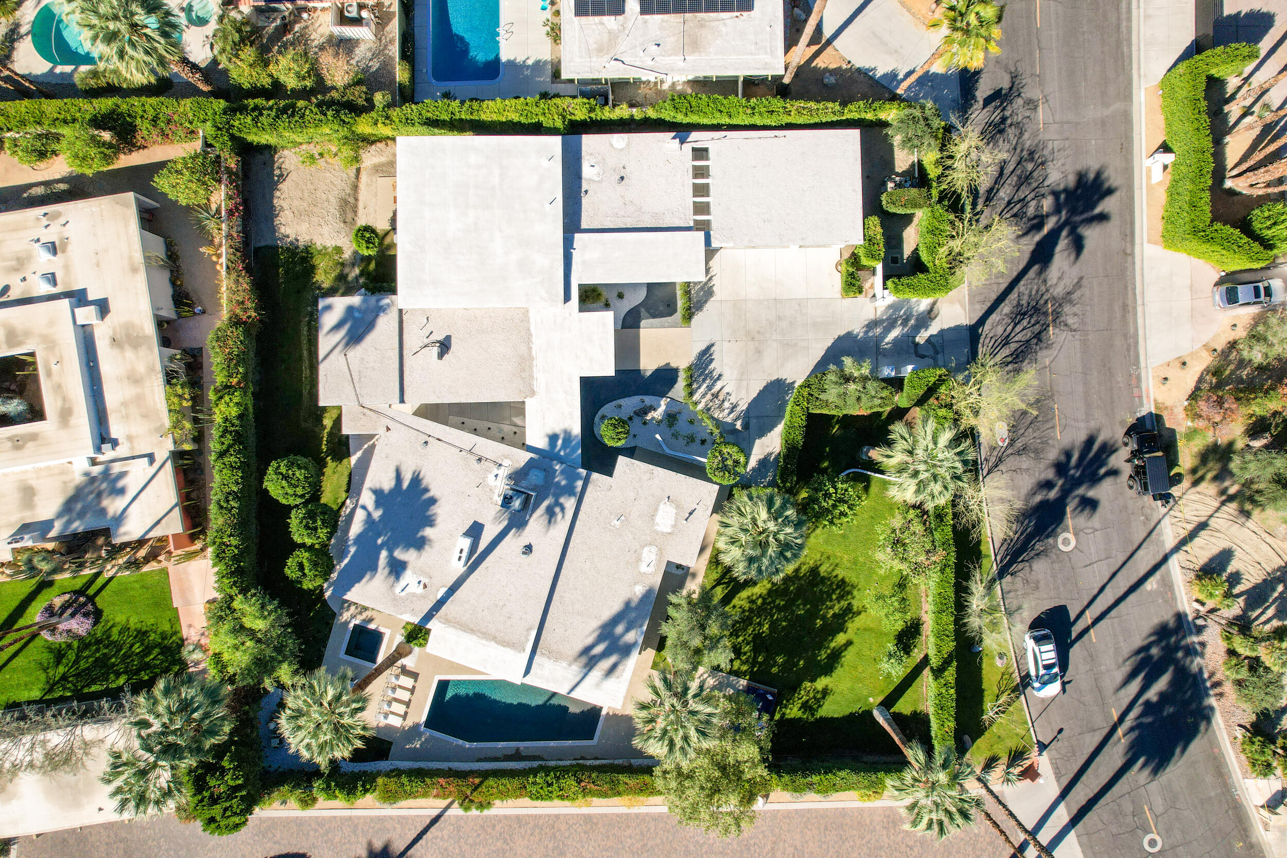 37521 Palm View Road Rancho Mirage, CA 92270 - Photo 57 of 61 an aerial view of a house with a yard and potted plants