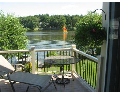 28 Beechwood Road Lynnfield, MA 01940 - Photo 2 of 11 a view of a balcony with chairs