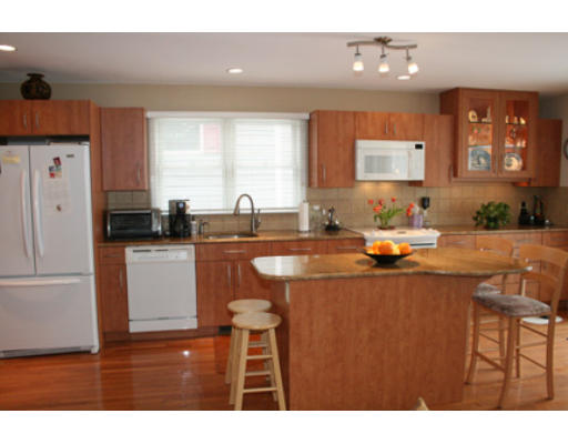 28 Beechwood Road Lynnfield, MA 01940 - Photo 5 of 11 a kitchen with a sink and cabinets
