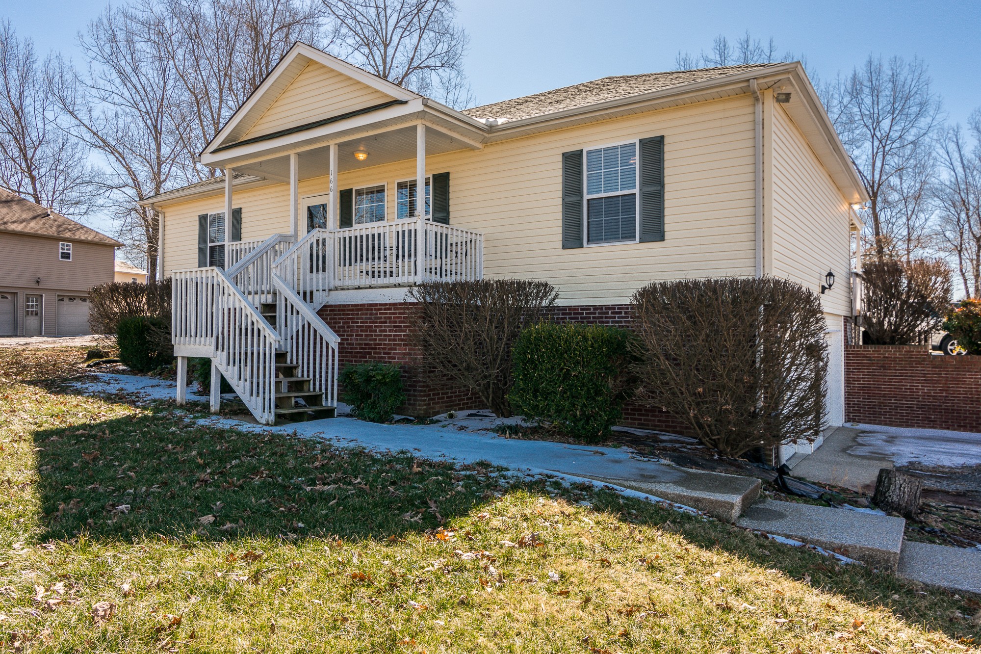 166 Switchboard Road Portland, TN 37148 - Photo 2 of 49 a front view of a house with a yard