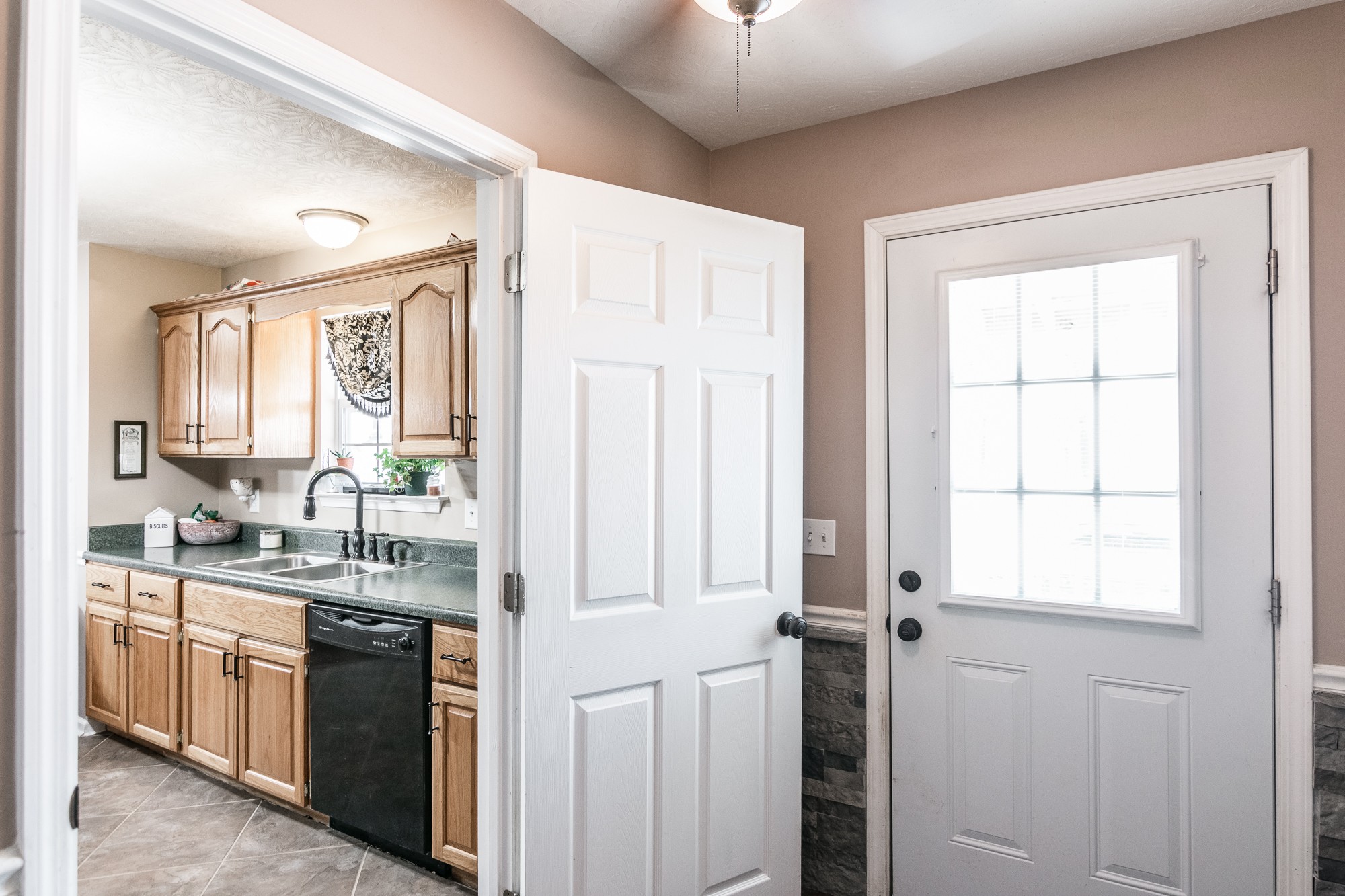 166 Switchboard Road Portland, TN 37148 - Photo 18 of 49 a kitchen with a sink stove and cabinets