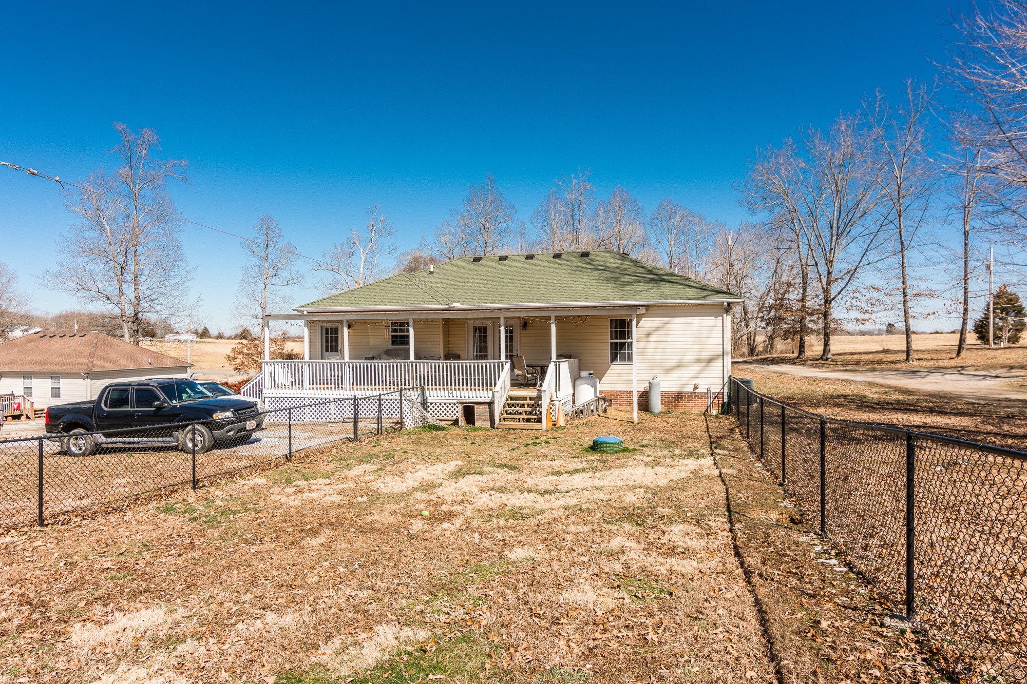 166 Switchboard Road Portland, TN 37148 - Photo 39 of 49 a front view of a house with a garden