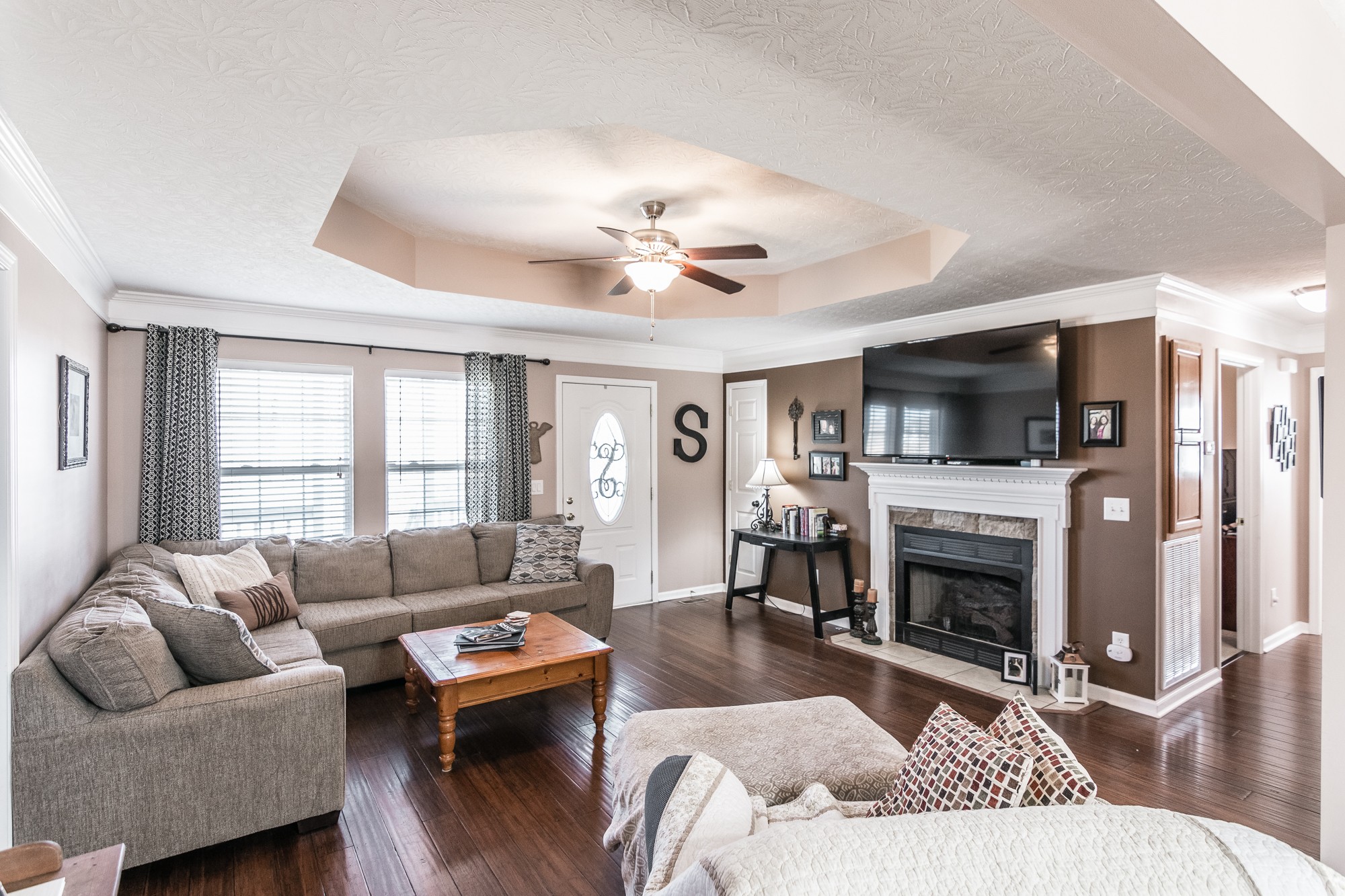 166 Switchboard Road Portland, TN 37148 - Photo 5 of 49 a living room with furniture flat screen tv and a fireplace