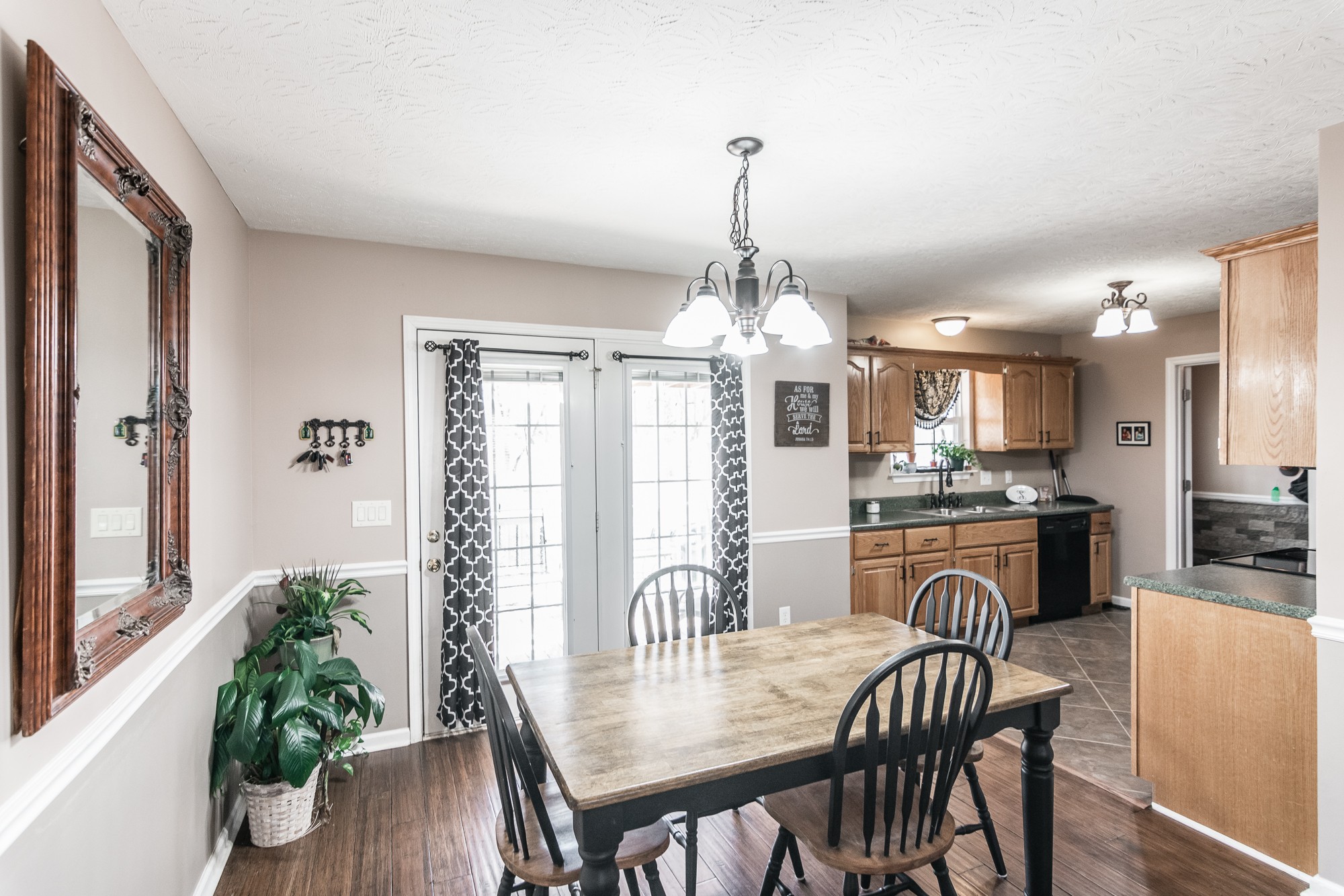 166 Switchboard Road Portland, TN 37148 - Photo 7 of 49 a view of a dining room with furniture wooden floor and chandelier