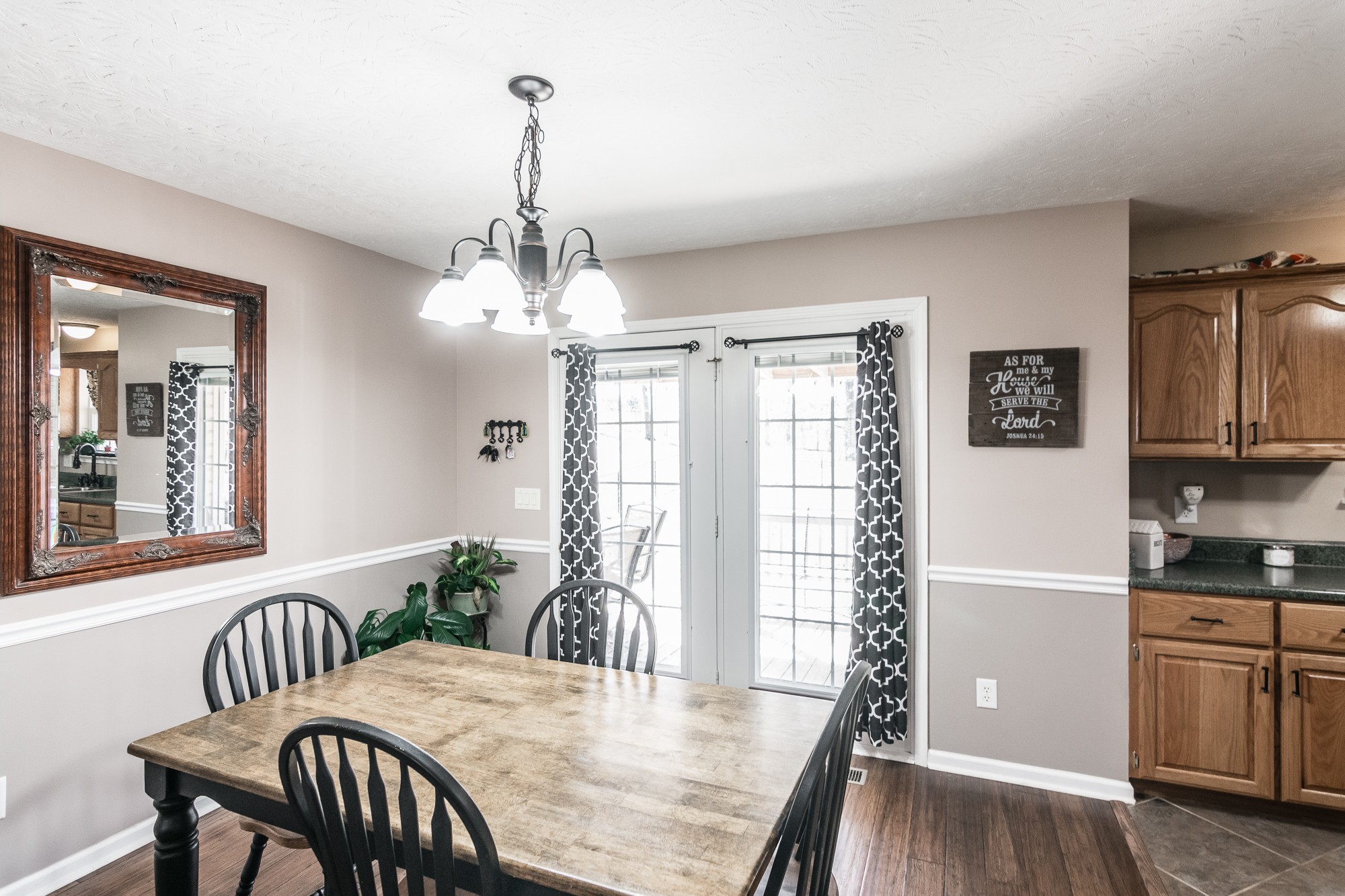 166 Switchboard Road Portland, TN 37148 - Photo 8 of 49 a view of a dining room with furniture window and wooden floor