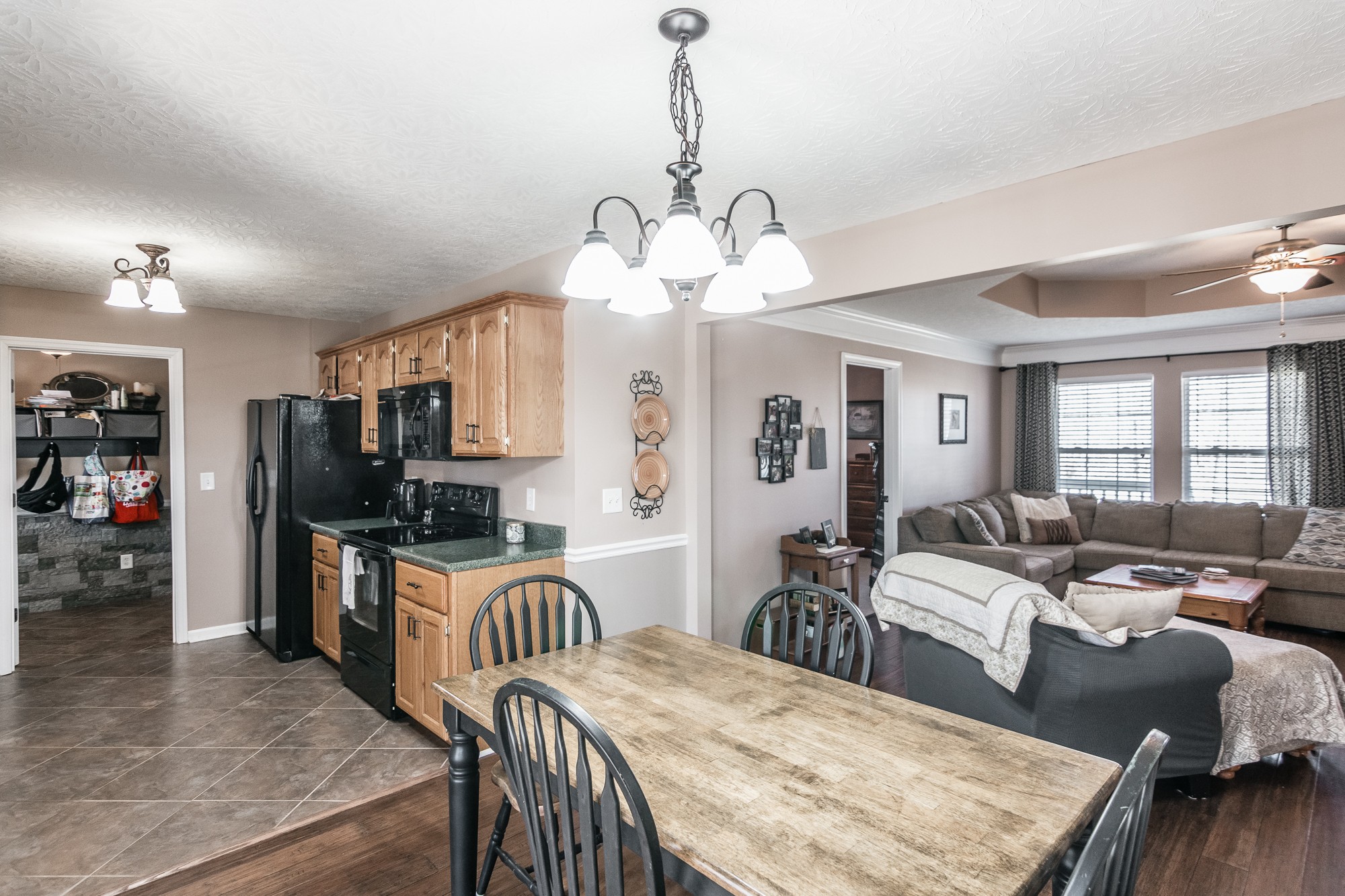 166 Switchboard Road Portland, TN 37148 - Photo 10 of 49 a large kitchen with a table and chairs