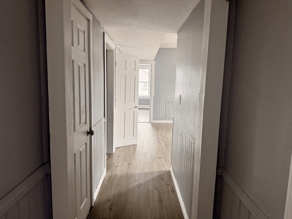 a view of a bathroom from a hallway