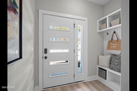 2126 Titanium Rock Road Durham, NC 27704 - Photo 2 of 20 a view of a hallway with front door