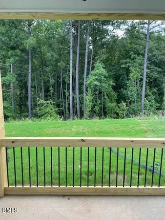 a view of a wooden fence