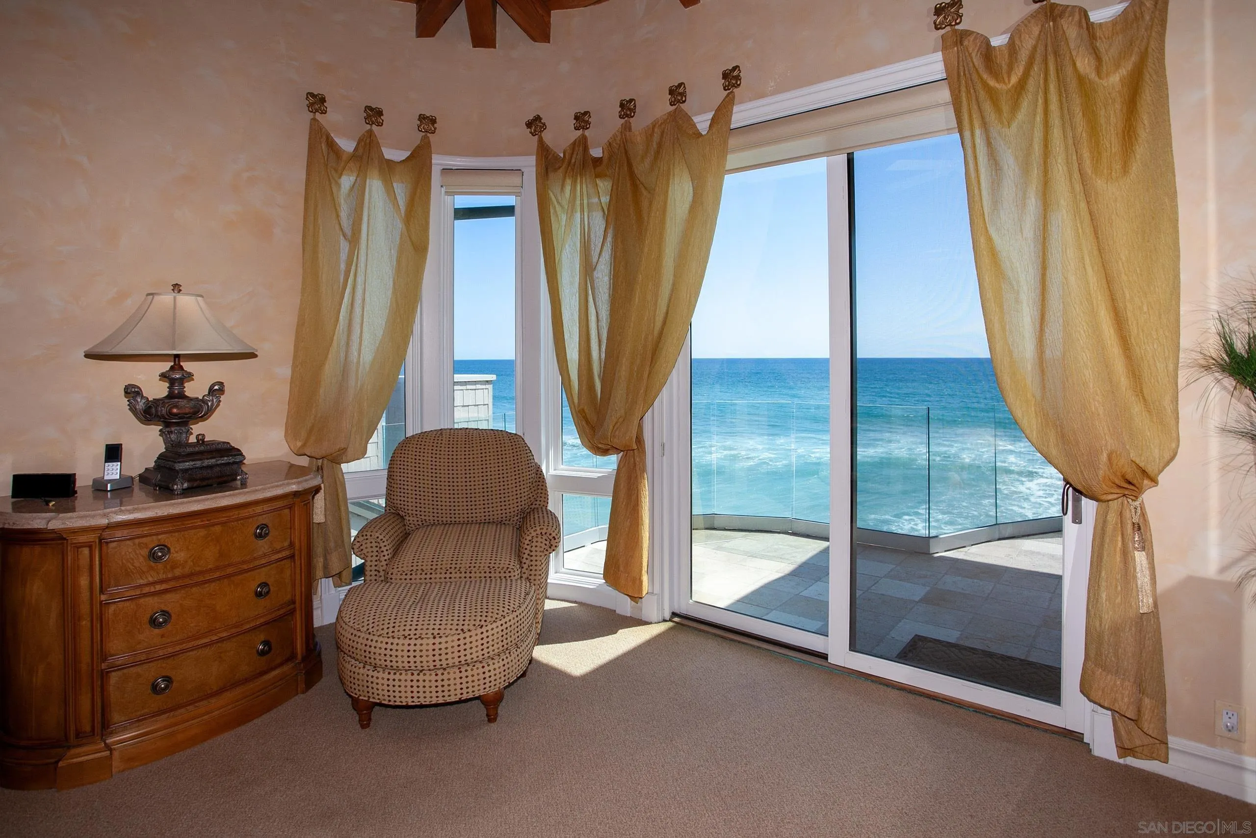 2901 Ocean Street, Unit 3 Carlsbad, CA 92008 - Photo 15 of 29 a living room with a furniture and a window