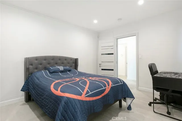 a bathroom with a sink toilet and vanity