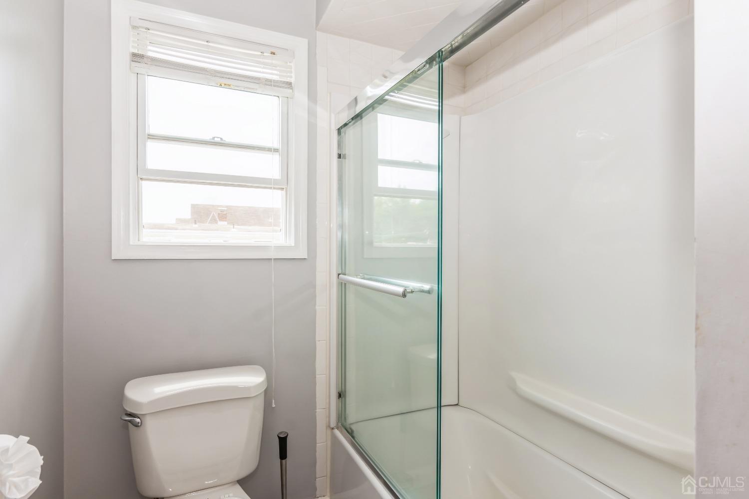 640 Bound Brook Road Middlesex, NJ 08846 - Photo 21 of 23 a bathroom with a toilet and a shower