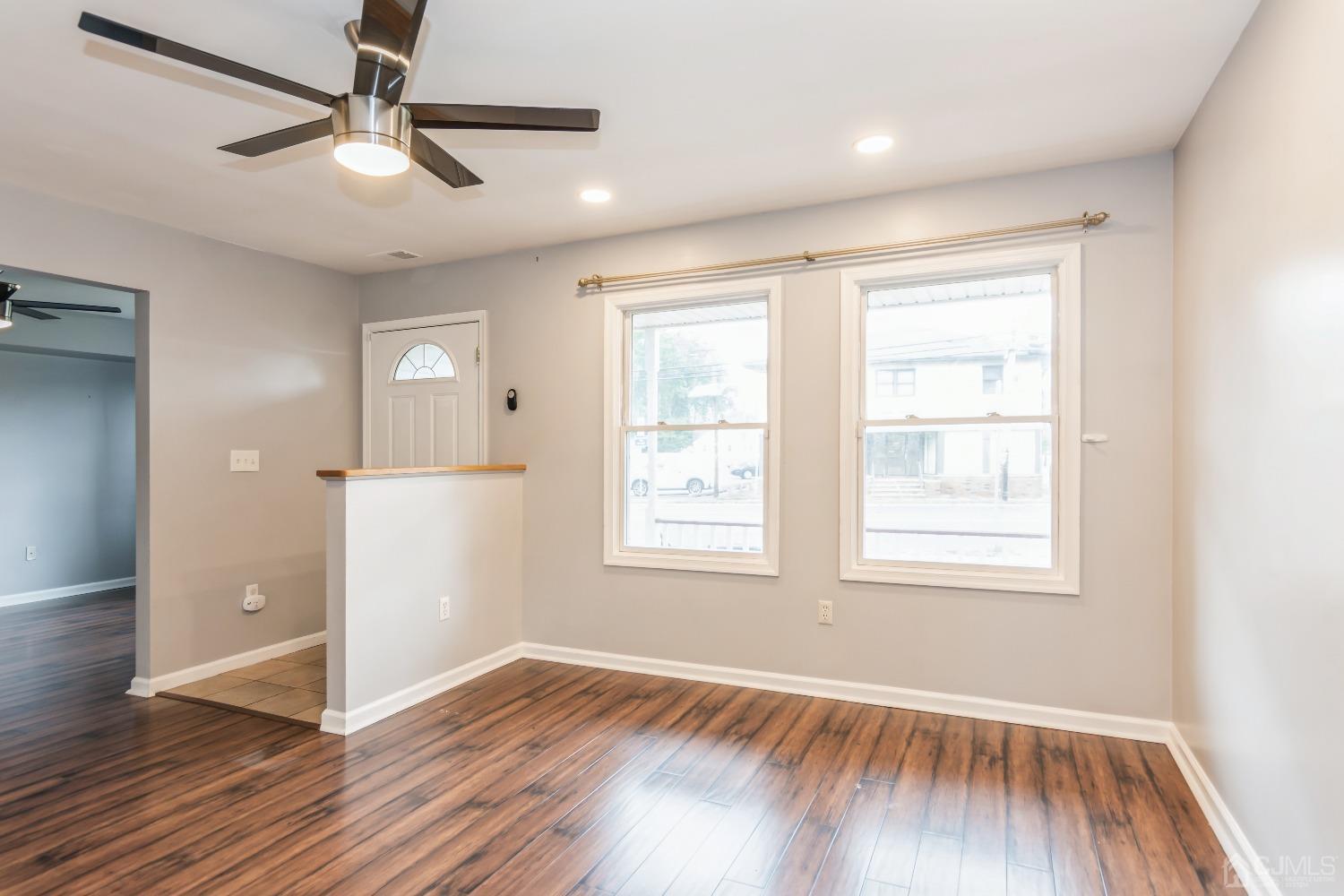 640 Bound Brook Road Middlesex, NJ 08846 - Photo 4 of 23 a view of an empty room with wooden floor and a window