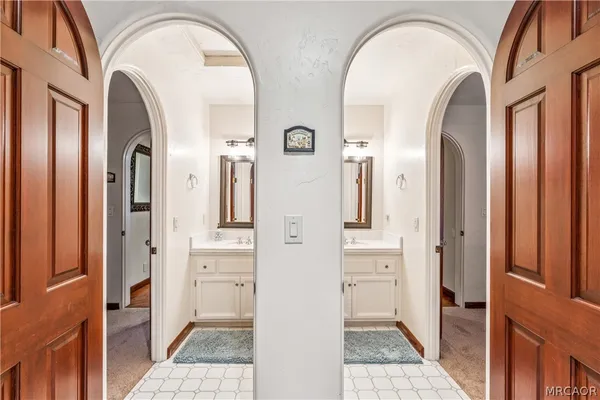 a view of entryway with wooden floor and stairs
