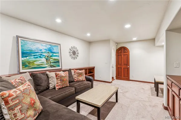 a view of sitting area with furniture on wooden deck