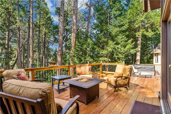 a backyard of a house with outdoor seating