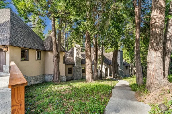 a view of house with yard