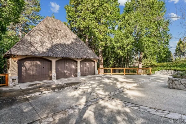 an aerial view of a house with garden space
