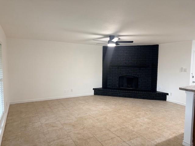 3410 Maple Lane Rowlett, TX 75089 - Photo 4 of 8 a living room with a fireplace