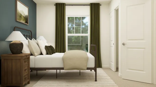 a bedroom with furniture and a window