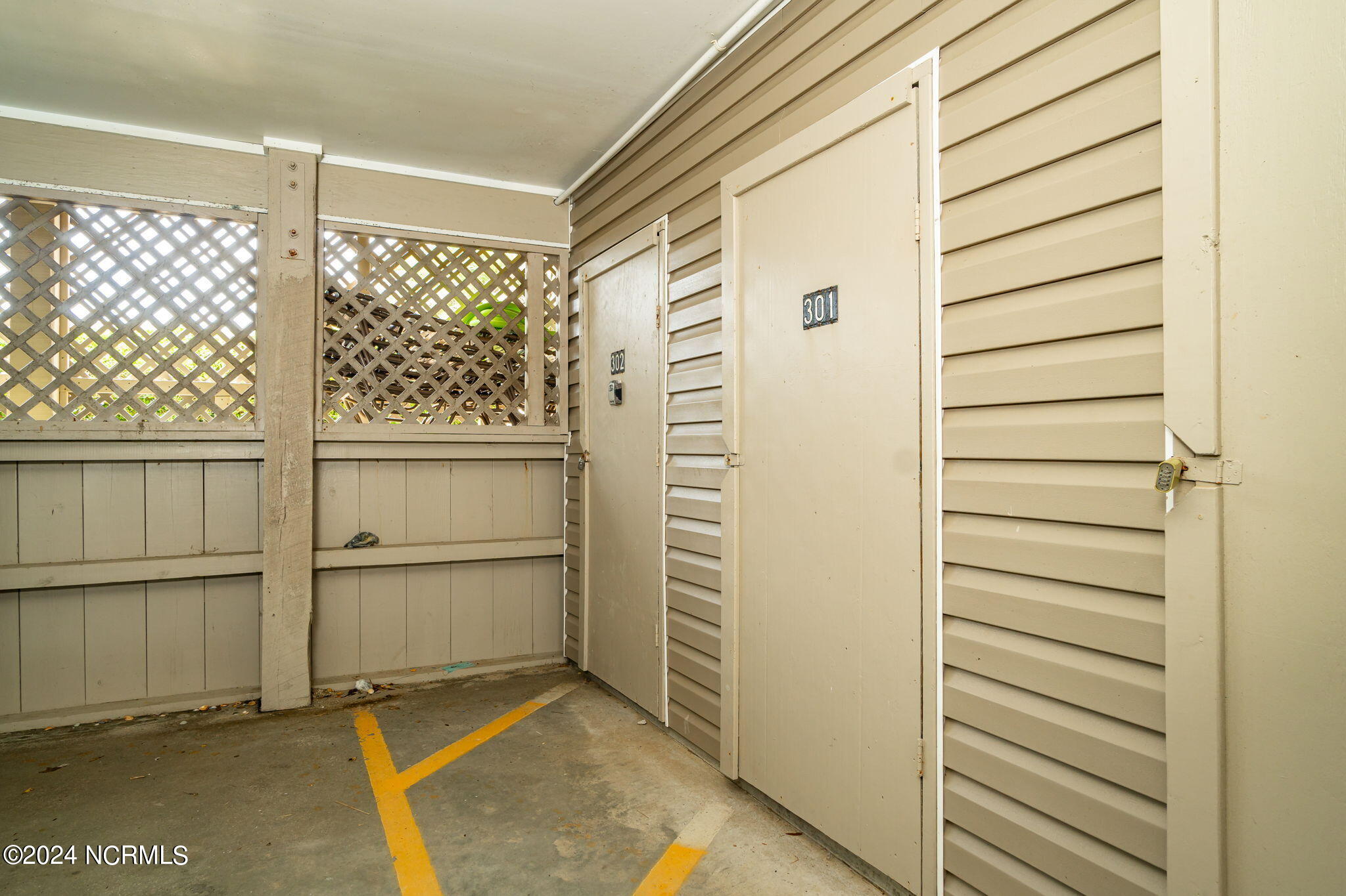 1701 Salter Path Road, Unit D301 Indian Beach, NC 28512 - Photo 31 of 60 Storage closet in parking area