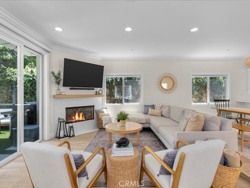 1729 Haynes Lane Redondo Beach, CA 90278 - Photo 13 of 44 a living room with fireplace furniture and a flat screen tv