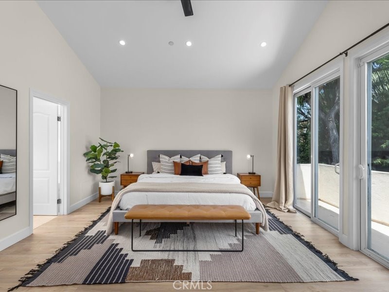 1729 Haynes Lane Redondo Beach, CA 90278 - Photo 17 of 44 a bedroom with a large bed and a potted plant