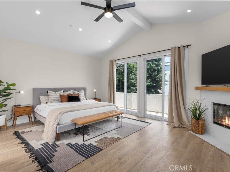 1729 Haynes Lane Redondo Beach, CA 90278 - Photo 19 of 44 a spacious bedroom with a bed and glass window