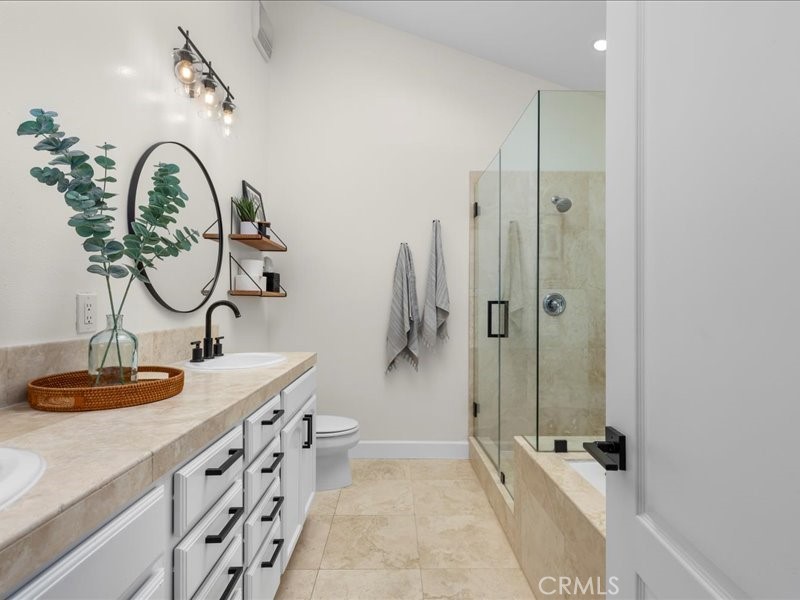 1729 Haynes Lane Redondo Beach, CA 90278 - Photo 25 of 44 a bathroom with sinks a mirror and a shower