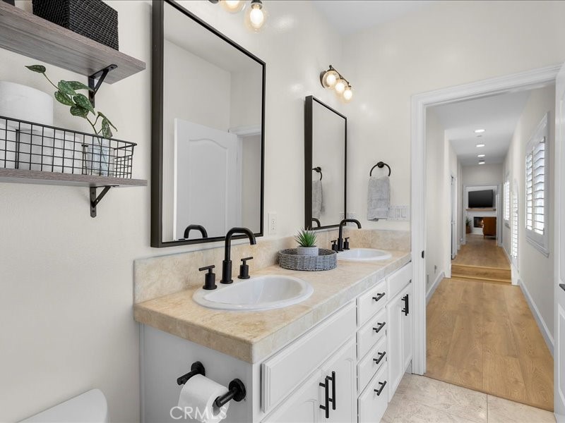 1729 Haynes Lane Redondo Beach, CA 90278 - Photo 32 of 44 a bathroom with double sink and two mirror