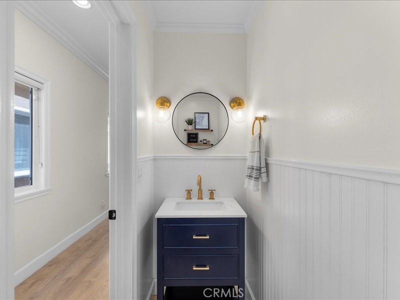 1729 Haynes Lane Redondo Beach, CA 90278 - Photo 37 of 44 a bathroom with a sink and a mirror