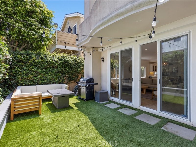 1729 Haynes Lane Redondo Beach, CA 90278 - Photo 40 of 44 a backyard of a house with yard fire pit and outdoor seating