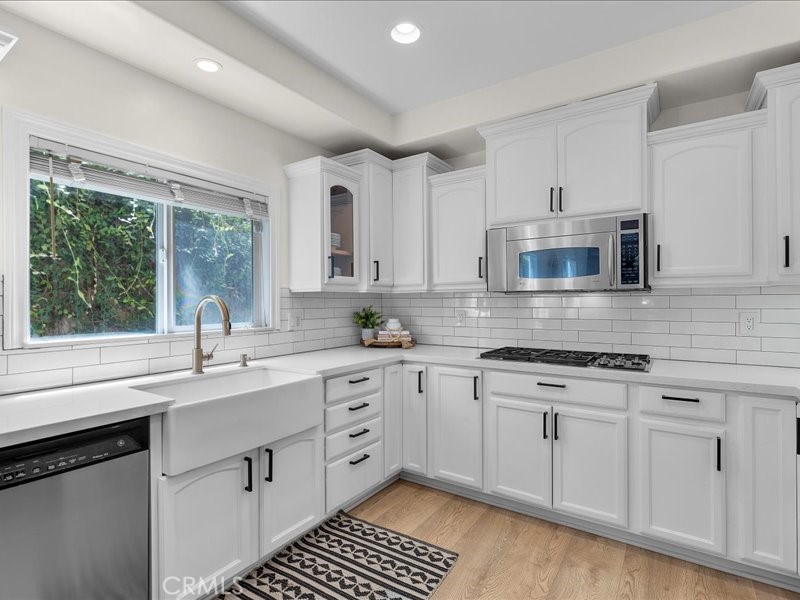 1729 Haynes Lane Redondo Beach, CA 90278 - Photo 6 of 44 a kitchen with appliances cabinets and a sink