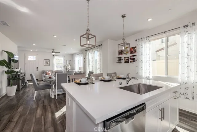 a kitchen with lots of counter space and a sink