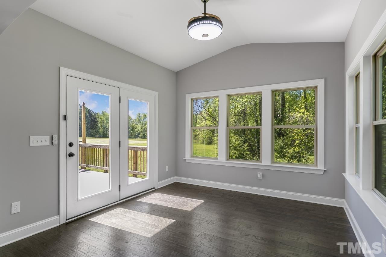 8340 Yellow Aster Court Willow Spring, NC 27592 - Photo 13 of 35 a view of an empty room with a window