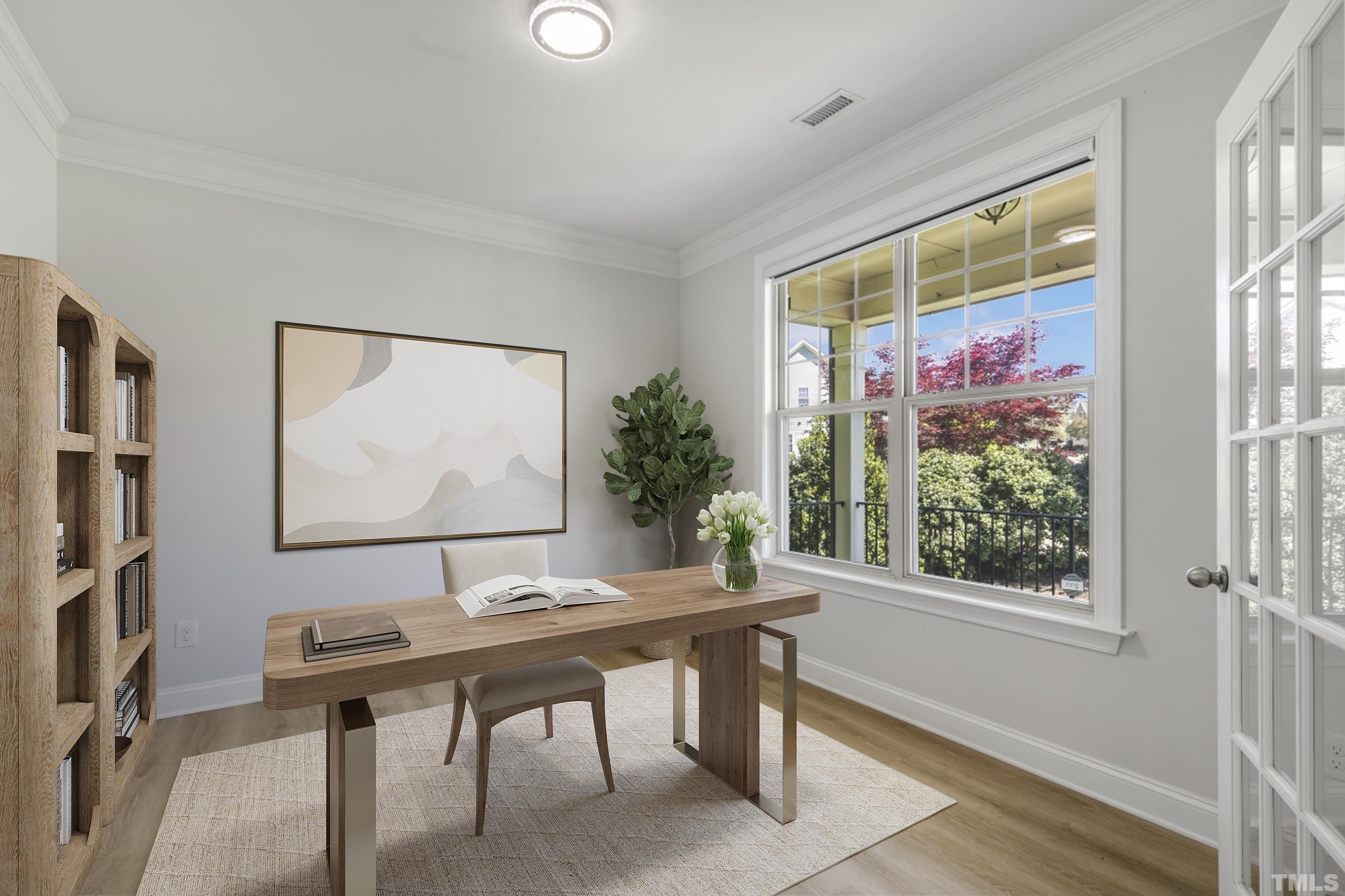 8340 Yellow Aster Court Willow Spring, NC 27592 - Photo 3 of 35 a view of a workspace room with furniture and window
